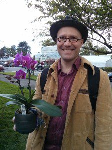 James Whetzel buys an orchid at a previous Friends of the Conservatory plant sale