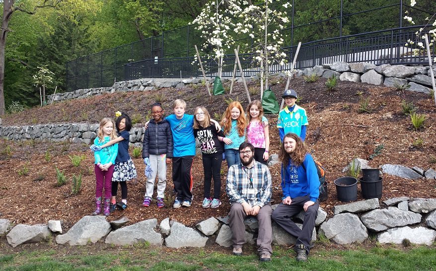Students from John Hay Elementary School helped spread mulch in Lower Kinnear Park on April 14.