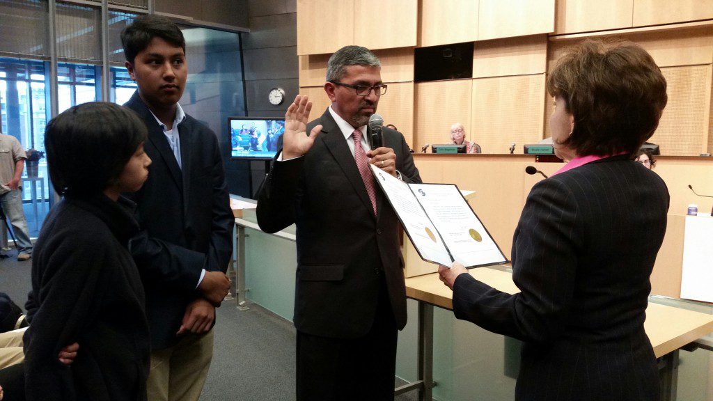 The Seattle City Clerk administered the Oath of Office to Jesus Aguirre, the incoming superintendent of Seattle Parks and Recreation. Aguirre was joined by his two sons, Diego, far left, and Pablo.
