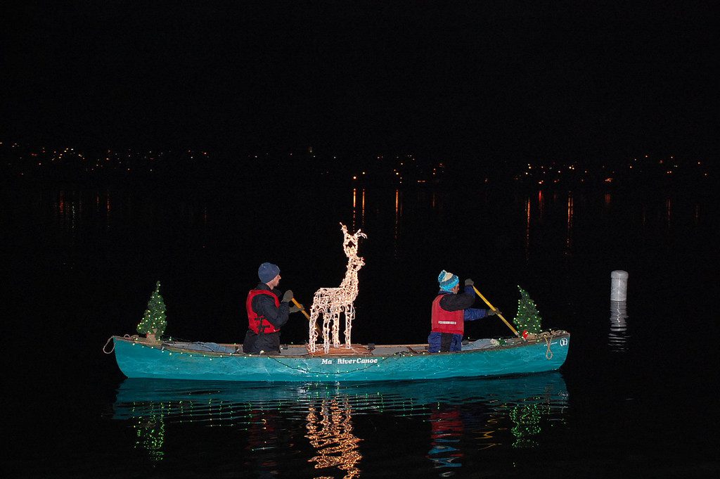 Canoe adorned in lights on Green Lake