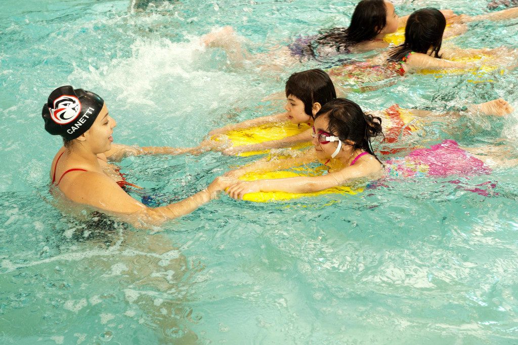 two girls in swimming lessons