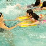 two girls in swimming lessons